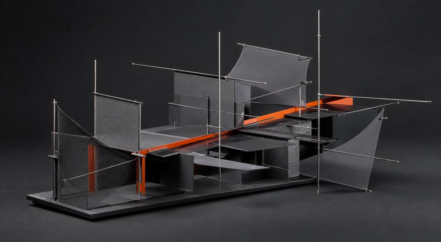 Architectural framework of graphite planes, fine rods, mesh, and one orange spine